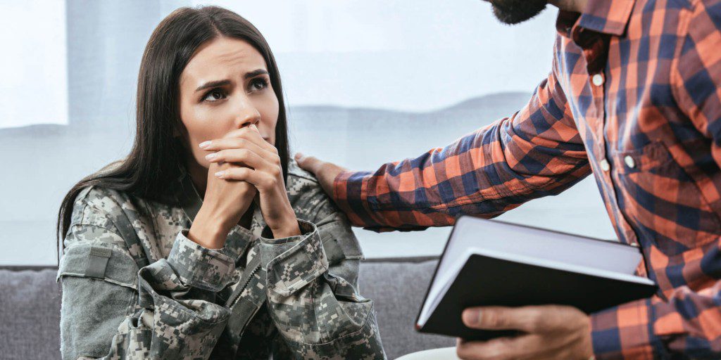 Doctor talking to a patient about Veteran Alcoholism