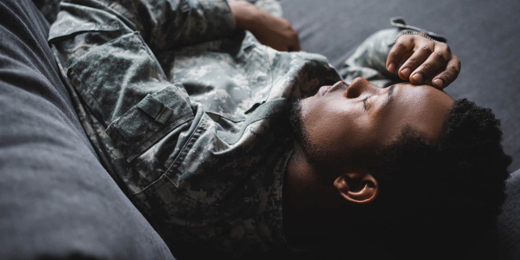 Veteran sleeping on the couch at Veteran Rehab Texas